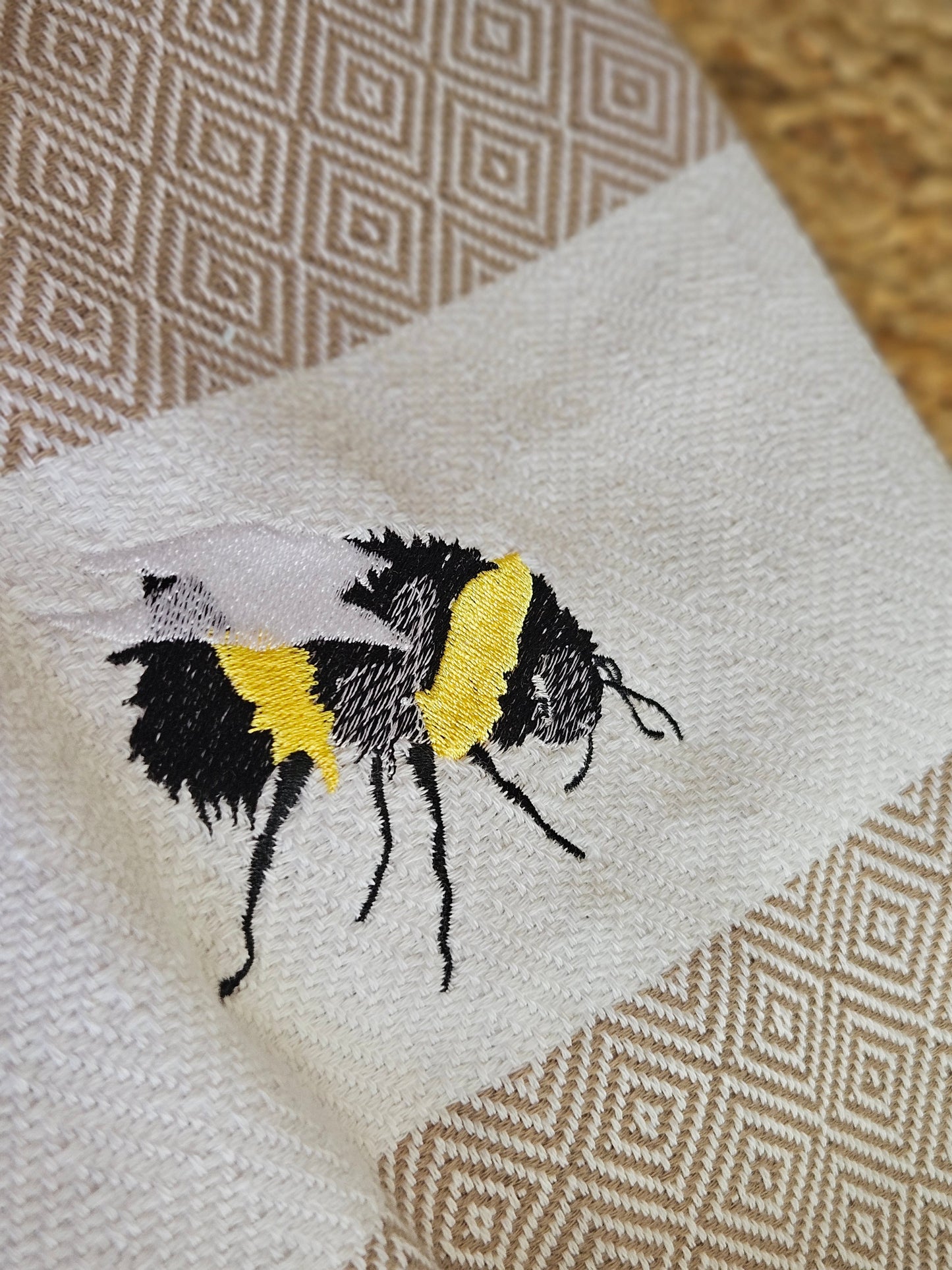 Embroidered bumble bee throw