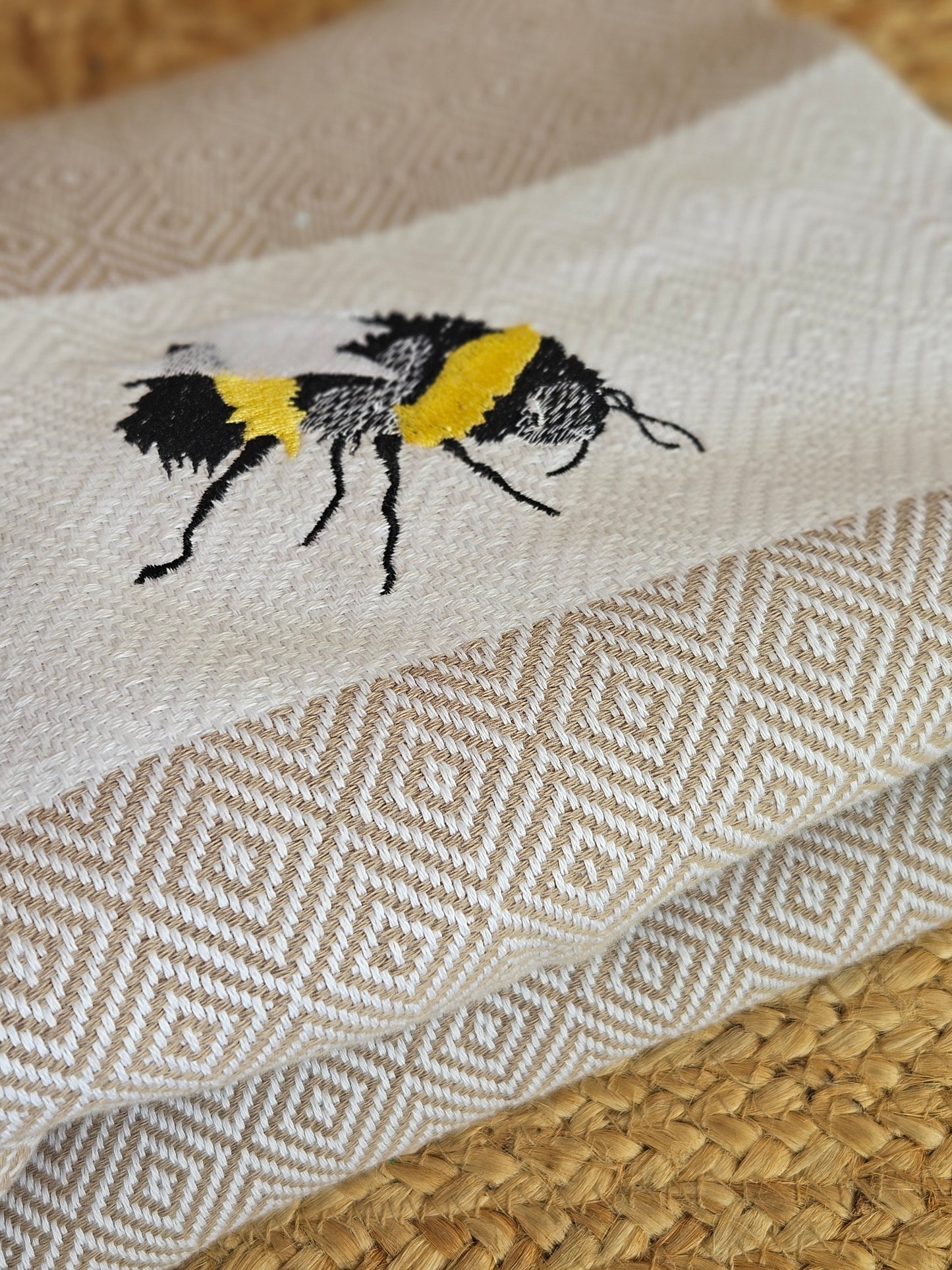 Embroidered bumble bee throw