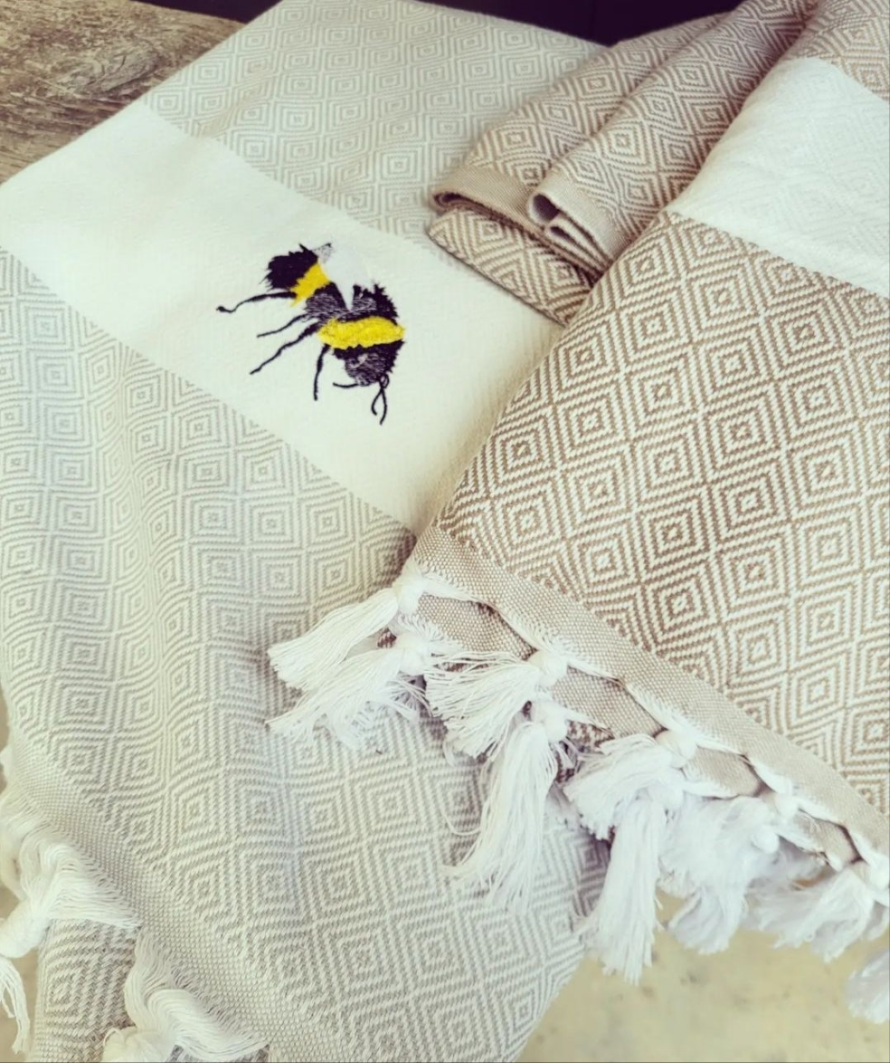 Embroidered bumble bee throw