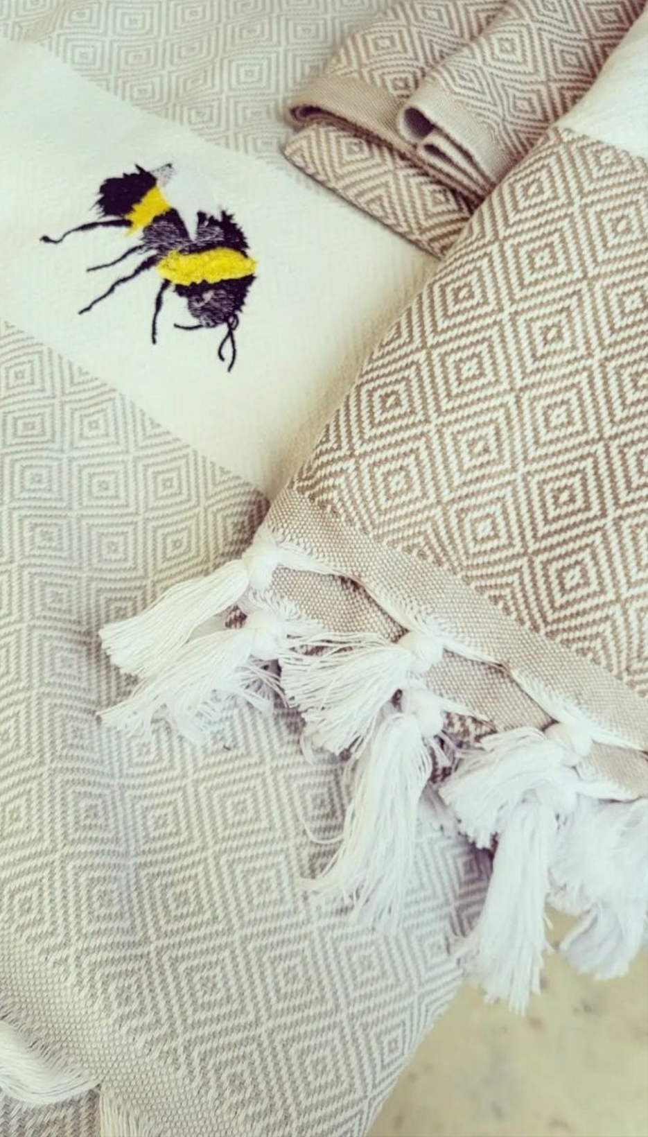 Embroidered bumble bee throw