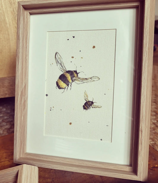 Mummy bee and baby bee framed canvas prints
