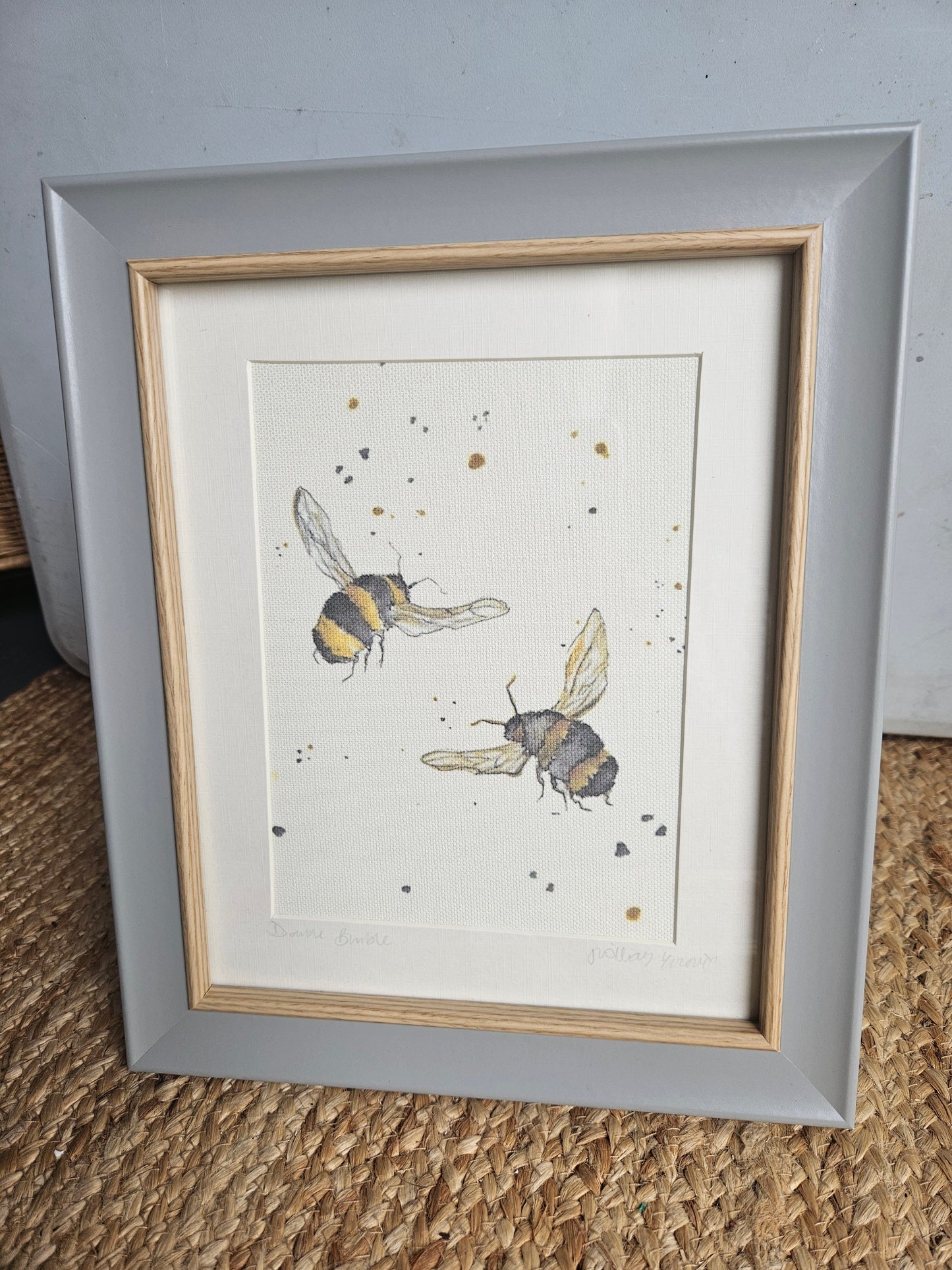 Double bee canvas print in grey wooden frame