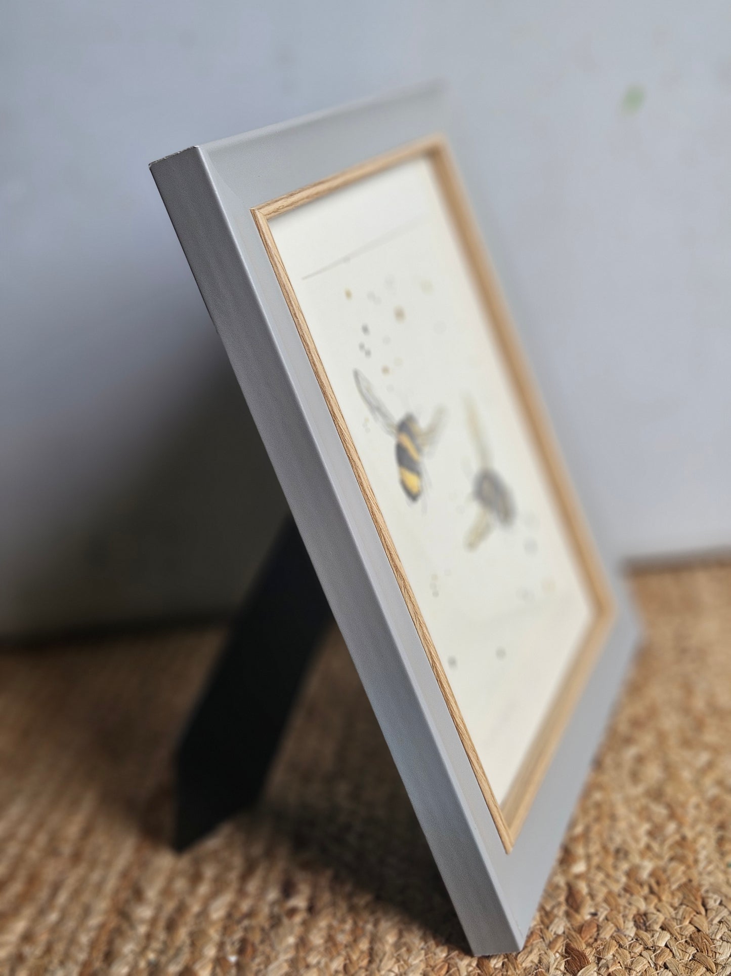 Double bee canvas print in grey wooden frame