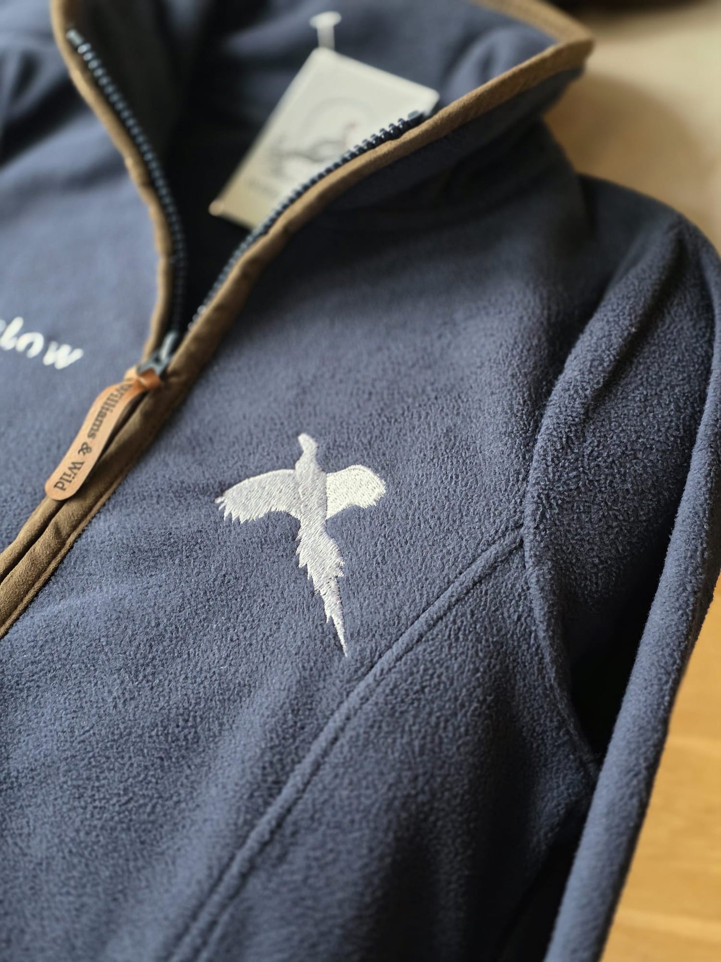 Embroidered WHITE FLYING PHEASANT Fleece Jacket (women's)